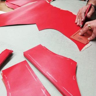 Yellow leather pattern marking with template - Kendrick manufacturing process